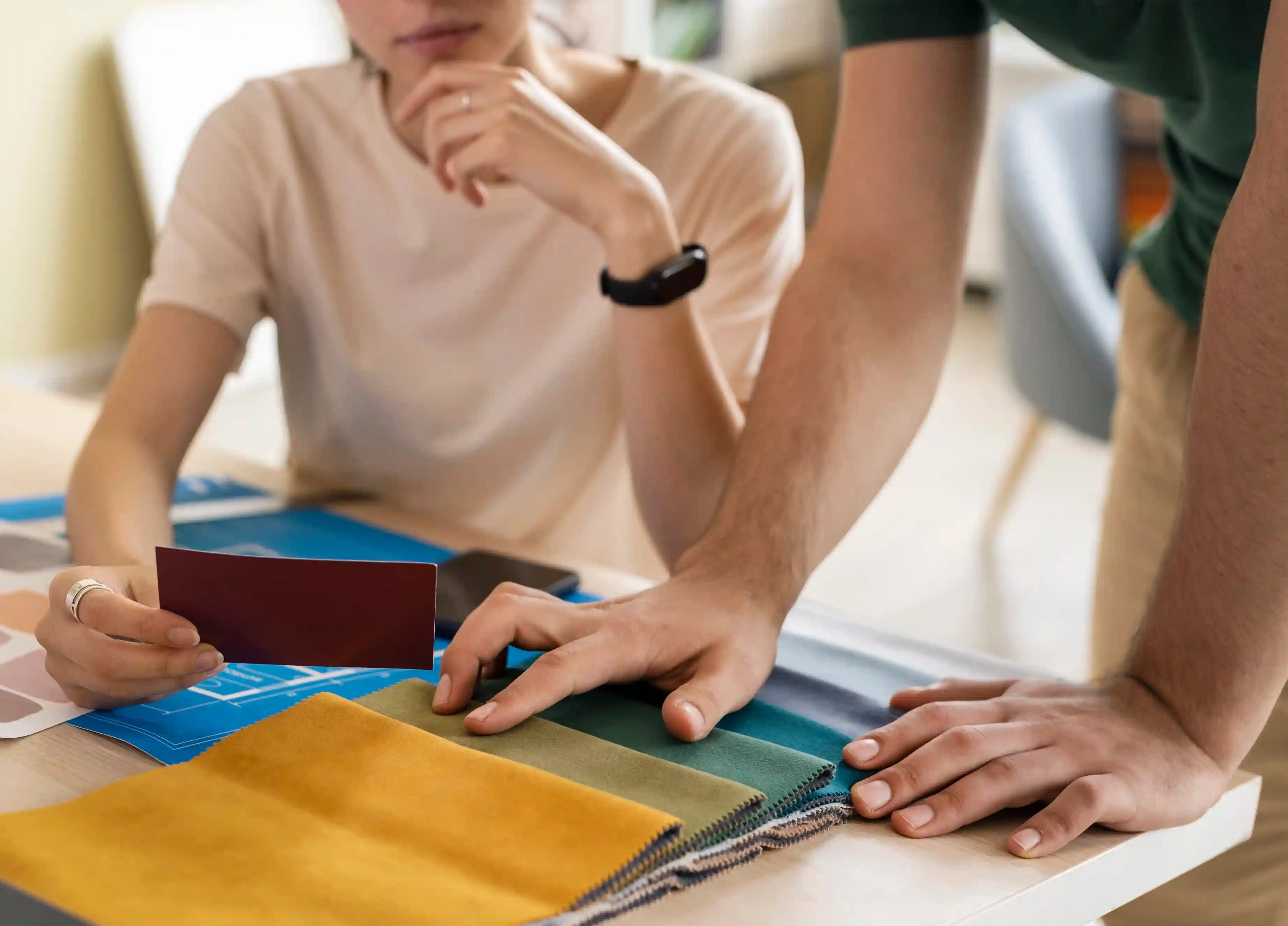 Fashion designers selecting the best fabrics